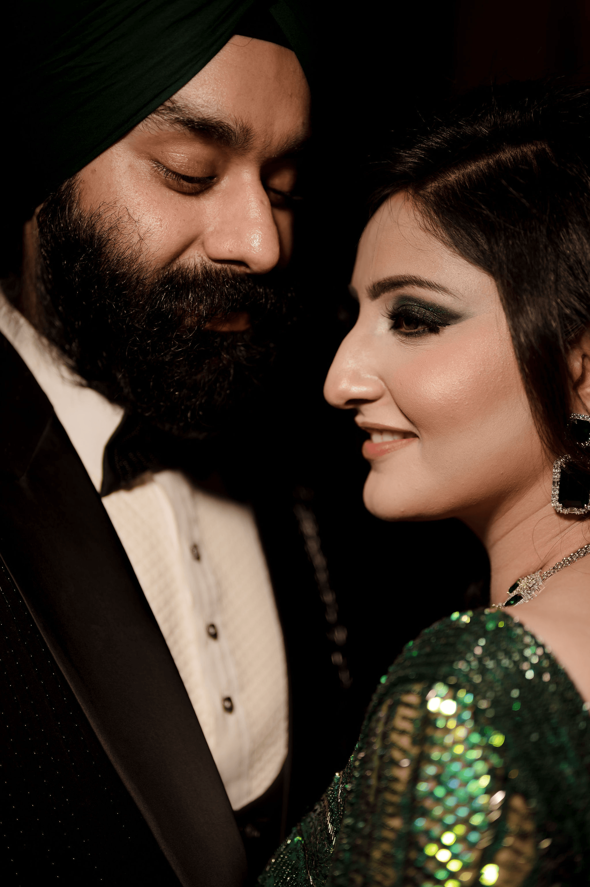 Groom wearing an elegant black tuxedo
